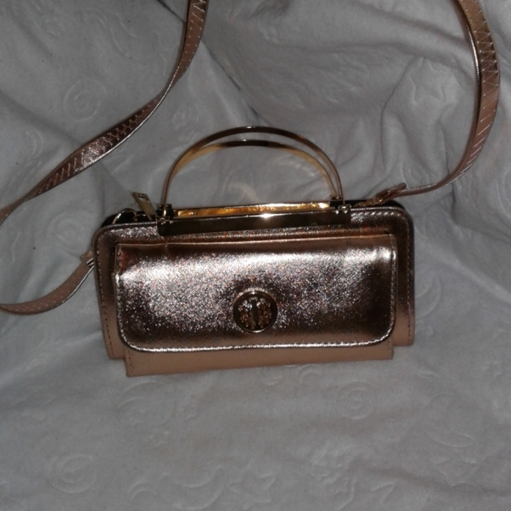 Gold purse sleek color converts into wallet